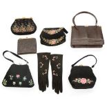 A collection of evening bags to include a cloth black early 1950s embroidered cocktail with a lemon