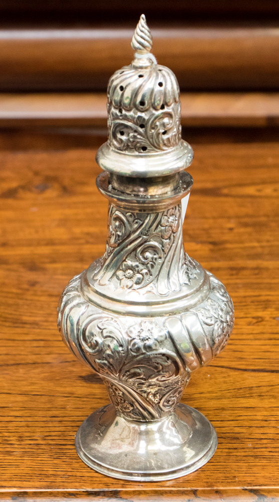 An Edwardian sugar sifter, embossed foliate and floral decoration, William Aitken Birmingham 1902,