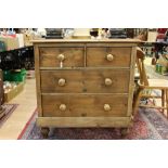 A 19th Century pine chest of drawers, fitted with two short over two long graduated drawers,