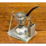 An Edwardian silver brandy warmer with burner and matched saucepan with ebonised handle, miniature,