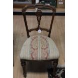 Three mid Victorian mahogany dining chairs, standing on turned legs to front,
