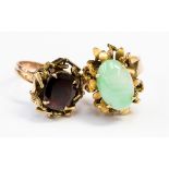 Two modernist 14ct gold rings, Jadeite and garnet, ring size P, total gross weight approximately 13.