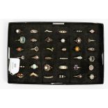 A large collection of silver costume rings, various stones including opal, amber,