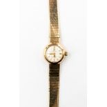 An Omega Ladymatic 9ct gold ladies bracelet watch,