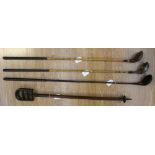 Golf Memorabilia: An assortment of three golf clubs to comprise: an indistinctly marked wood,