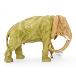 A Royal Dux figure of an Elephant, no stamp, dust gilded over green,