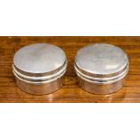 A pair of matched circular silver boxes, crest engraving worn, Levi and Salaman,