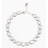 A Fiorelli silver bracelet, each link set with white faceted stones, 18.