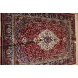 Red ground Kashmir rug,