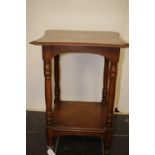 A 20th Century oak two-tier occasional table,