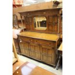 A George V oak mirror-backed sideboard,