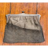 A silver framed chain mail purse, London 1919, marked VS, total gross weight approximately 243.