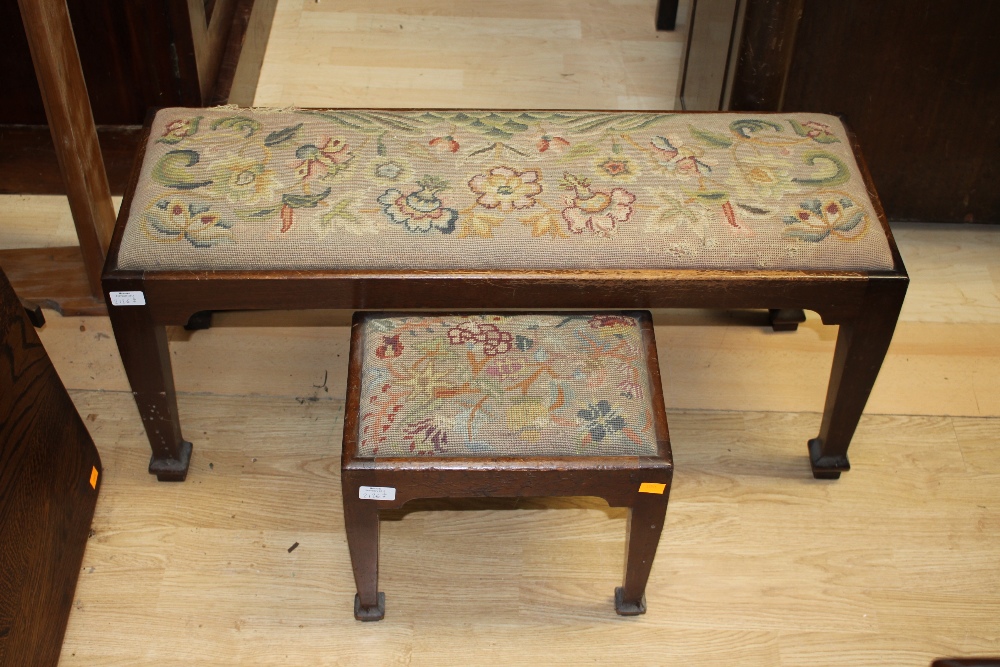 A collection of furniture comprising an Edwardian open armchair, a tripod wine table,