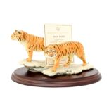 Compton Woodhouse limited edition 1450/4050 'Snow Tigers' on wooden plinth with certificate,