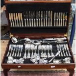 A plated cutlery service in box on stand,