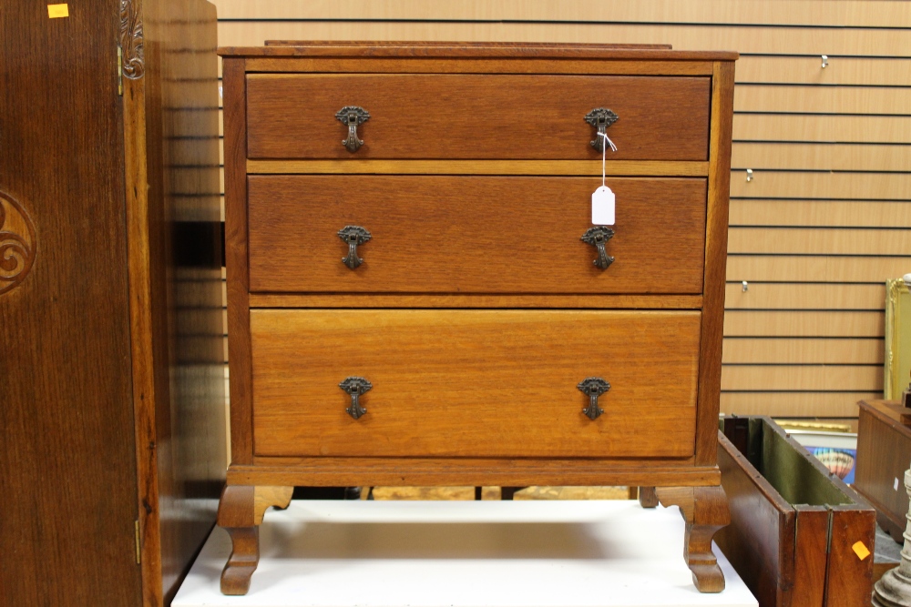 An early 20th Century oak three drawer chest