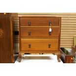 An early 20th Century oak three drawer chest