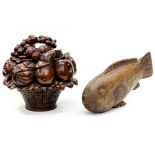 Carved mahogany fruit in a basket and a Pine carved Fish