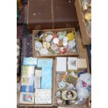 Three boxes of ceramic tea pots, small tea set, glassware and flatware,