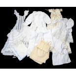 A collection of children's costumes to include Christening robes, nightdress in cotton,