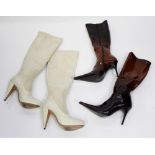 A beige suede stiletto high heeled boot with beige patent strips round front,
