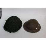 WW2 British MKII Steel helmet. Compee with chinstrap.