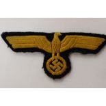 WW2 Third Reich Kreigsmarine Officers quality breast eagle in yellow cellon thread.