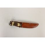 Hunting Knife. Alloy Pommel and Stag Horn grip. Brass crossguard. 12cm single edged blade.