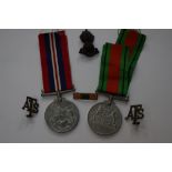 WW2 British ATS Medal group of War and Defence medals, ATS brass shoulder titles,