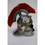 Replica Roman Legionaries Galea helmet. Steel and brass construction. Red horse hair plume to crown.
