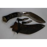 Gurka Kukri knife and scabbard. Complete with both small knives.