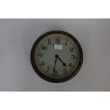 WW2 British RAF Air Ministry marked wall clock. Wind up movement with integral key.