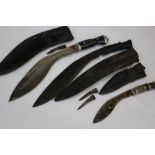 Three Gurka Kukri knives. One with 29cm steel blade. With scabbard.
