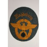 WW2 Third Reich Schutzpolizie sleeve eagle for Madgeburg. Machine embroidered.