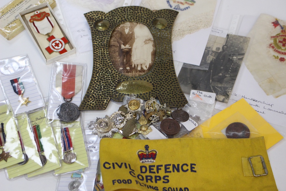 Box of mixed WW1 & WW2 British items to include nine miniature medals,