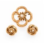 An early 20th century 14ct gold brooch and clip earring set,