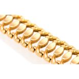 An 18ct yellow gold fancy link bracelet, openwork leaf shaped design to centre with fancy borders,