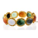 A multi coloured jade 18ct yellow gold link bracelet signed Gubelin 4279-5,