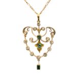 An Edwardian diamond and green tourmaline set yellow gold pendant and chain,