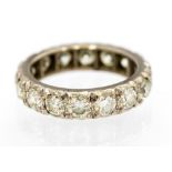 A diamond full eternity ring, a total of sixteen round brilliant cut diamonds,