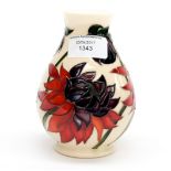 A Moorcroft vase in the Ruby Red pattern, designed by Emma Bossons, shape 7/5, dated 2012,