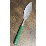 A George III silver and green stained ivory butter knife,