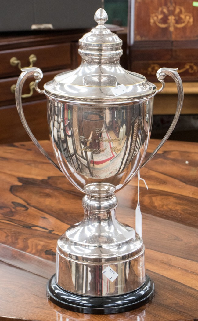 A large silver plated trophy cup,