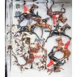 Britains: a small collection of Britains hunting figures to comprise, nine on horseback,