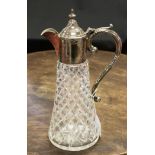 An Elizabeth II silver mounted cut glass claret jug,