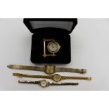Three various ladies wristwatches and a miniature 'Boots' clock (4)