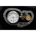 A gentlemen's silver open faced pocket watch on a silver chain with a fob containing an 1887