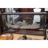 A large model of a passenger liner, named 'Bulawayo' fitted in a wooden glazed case,