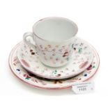 A tin glaze lustre cup and saucer together with a similar tea plate (3)