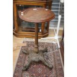 A Victorian mahogany topped bronze based extending pub table,